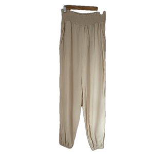 NWOT Twik cream haram pants with pockets. Size M